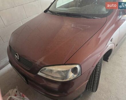 Красный Опель Астра, объемом двигателя 1.4 л и пробегом 114 тыс. км за 4100 $, фото 1 на Automoto.ua