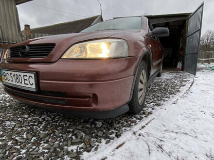 Красный Опель Астра, объемом двигателя 1.2 л и пробегом 327 тыс. км за 3200 $, фото 1 на Automoto.ua