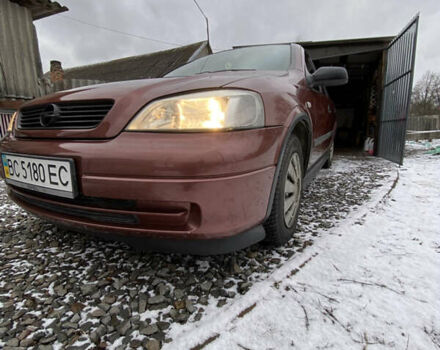 Красный Опель Астра, объемом двигателя 1.2 л и пробегом 327 тыс. км за 3200 $, фото 1 на Automoto.ua