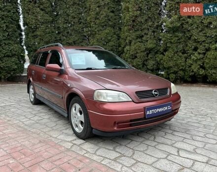 Красный Опель Астра, объемом двигателя 1.6 л и пробегом 266 тыс. км за 4000 $, фото 1 на Automoto.ua