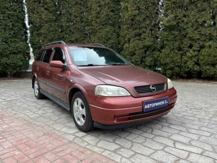 Красный Опель Астра, объемом двигателя 1.6 л и пробегом 266 тыс. км за 3800 $, фото 1 на Automoto.ua
