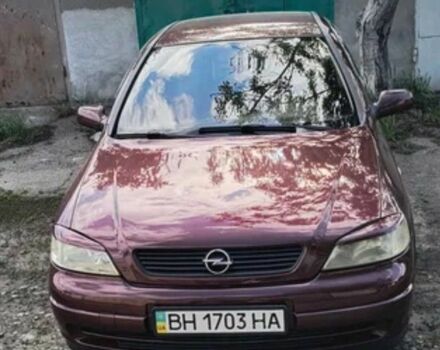 Красный Опель Астра, объемом двигателя 1.4 л и пробегом 210 тыс. км за 3600 $, фото 1 на Automoto.ua