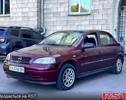 Красный Опель Астра, объемом двигателя 1.6 л и пробегом 250 тыс. км за 3300 $, фото 1 на Automoto.ua