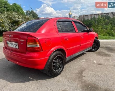 Красный Опель Астра, объемом двигателя 1.8 л и пробегом 319 тыс. км за 2350 $, фото 1 на Automoto.ua