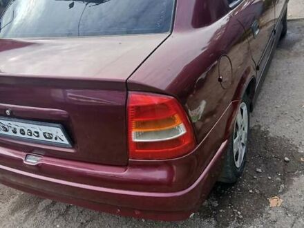 Червоний Опель Астра, об'ємом двигуна 1.4 л та пробігом 247 тис. км за 2300 $, фото 1 на Automoto.ua