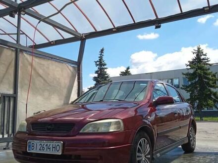 Красный Опель Астра, объемом двигателя 1.6 л и пробегом 221 тыс. км за 2500 $, фото 1 на Automoto.ua