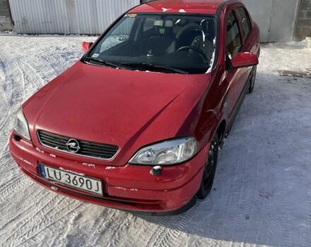 Красный Опель Астра, объемом двигателя 1.7 л и пробегом 244 тыс. км за 2000 $, фото 1 на Automoto.ua