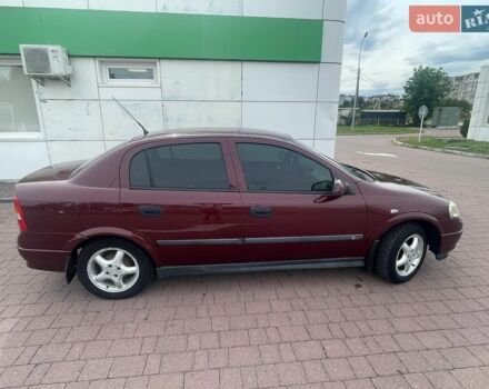 Красный Опель Астра, объемом двигателя 1.4 л и пробегом 186 тыс. км за 3250 $, фото 1 на Automoto.ua