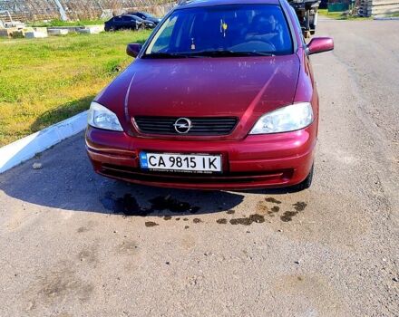 Красный Опель Астра, объемом двигателя 1.6 л и пробегом 175 тыс. км за 2899 $, фото 1 на Automoto.ua