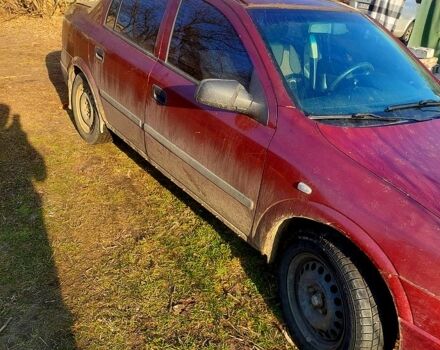 Красный Опель Астра, объемом двигателя 1.4 л и пробегом 100 тыс. км за 1100 $, фото 1 на Automoto.ua