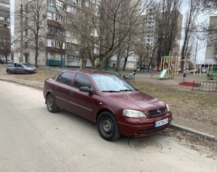 Красный Опель Астра, объемом двигателя 1.4 л и пробегом 300 тыс. км за 1450 $, фото 1 на Automoto.ua