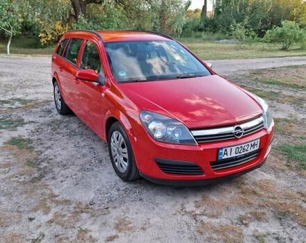 Красный Опель Астра, объемом двигателя 1.4 л и пробегом 226 тыс. км за 4000 $, фото 1 на Automoto.ua