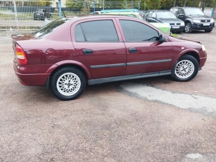 Красный Опель Астра, объемом двигателя 1.4 л и пробегом 420 тыс. км за 3200 $, фото 1 на Automoto.ua