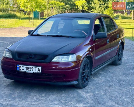Красный Опель Астра, объемом двигателя 1.4 л и пробегом 319 тыс. км за 2350 $, фото 1 на Automoto.ua