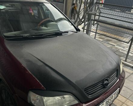 Красный Опель Астра, объемом двигателя 1.4 л и пробегом 300 тыс. км за 2600 $, фото 1 на Automoto.ua