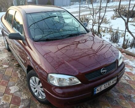 Красный Опель Астра, объемом двигателя 1.4 л и пробегом 120 тыс. км за 3950 $, фото 1 на Automoto.ua