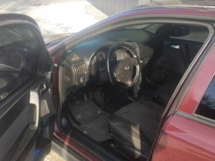 Красный Опель Астра, объемом двигателя 1.4 л и пробегом 240 тыс. км за 3599 $, фото 1 на Automoto.ua