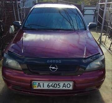 Красный Опель Астра, объемом двигателя 1.4 л и пробегом 297 тыс. км за 2500 $, фото 1 на Automoto.ua
