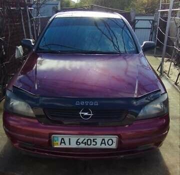 Красный Опель Астра, объемом двигателя 1.4 л и пробегом 297 тыс. км за 2500 $, фото 1 на Automoto.ua