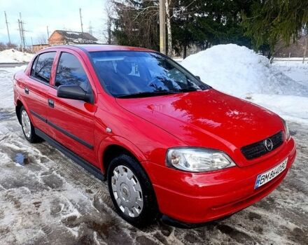 Красный Опель Астра, объемом двигателя 1.4 л и пробегом 199 тыс. км за 1311 $, фото 1 на Automoto.ua