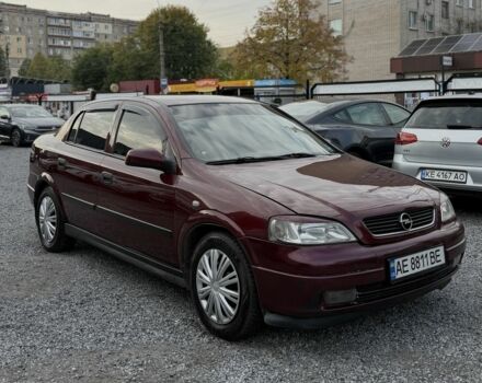 Красный Опель Астра, объемом двигателя 1.6 л и пробегом 265 тыс. км за 3588 $, фото 1 на Automoto.ua