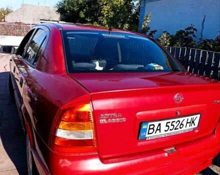 Красный Опель Астра, объемом двигателя 1.6 л и пробегом 165 тыс. км за 3300 $, фото 1 на Automoto.ua