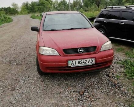 Красный Опель Астра, объемом двигателя 1.6 л и пробегом 150 тыс. км за 4000 $, фото 1 на Automoto.ua