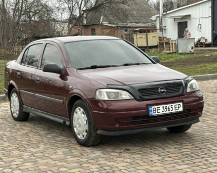 Красный Опель Астра, объемом двигателя 1.4 л и пробегом 245 тыс. км за 3350 $, фото 1 на Automoto.ua