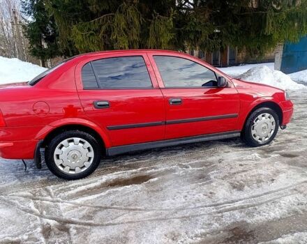Красный Опель Астра, объемом двигателя 1.4 л и пробегом 199 тыс. км за 1520 $, фото 1 на Automoto.ua