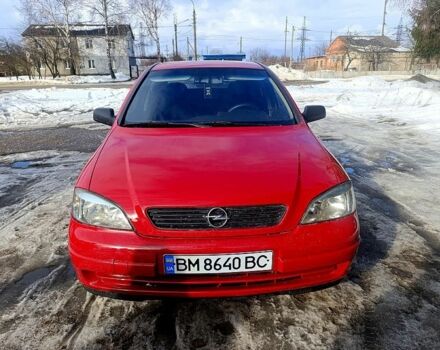 Красный Опель Астра, объемом двигателя 1.4 л и пробегом 199 тыс. км за 1355 $, фото 1 на Automoto.ua