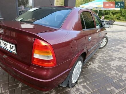 Красный Опель Астра, объемом двигателя 1.4 л и пробегом 285 тыс. км за 3100 $, фото 1 на Automoto.ua