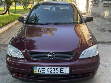 Красный Опель Астра, объемом двигателя 1.4 л и пробегом 177 тыс. км за 4600 $, фото 1 на Automoto.ua