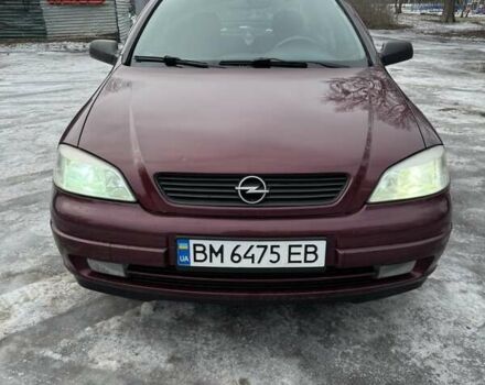 Красный Опель Астра, объемом двигателя 1.4 л и пробегом 100 тыс. км за 3500 $, фото 1 на Automoto.ua