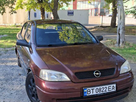 Красный Опель Астра, объемом двигателя 1.4 л и пробегом 229 тыс. км за 4900 $, фото 1 на Automoto.ua