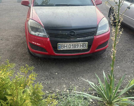 Красный Опель Астра, объемом двигателя 1.4 л и пробегом 200 тыс. км за 4000 $, фото 1 на Automoto.ua