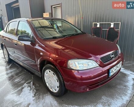 Красный Опель Астра, объемом двигателя 1.4 л и пробегом 172 тыс. км за 2800 $, фото 1 на Automoto.ua