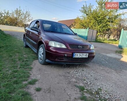 Красный Опель Астра, объемом двигателя 1.39 л и пробегом 195 тыс. км за 2200 $, фото 1 на Automoto.ua