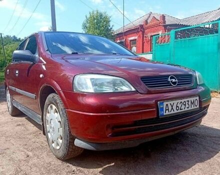 Красный Опель Астра, объемом двигателя 1.4 л и пробегом 176 тыс. км за 3700 $, фото 1 на Automoto.ua