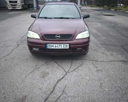 Червоний Опель Астра, об'ємом двигуна 1.36 л та пробігом 100 тис. км за 3000 $, фото 1 на Automoto.ua