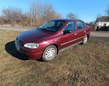 Красный Опель Астра, объемом двигателя 1.6 л и пробегом 172 тыс. км за 3000 $, фото 1 на Automoto.ua