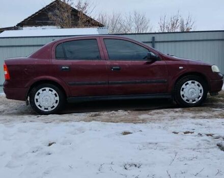 Червоний Опель Астра, об'ємом двигуна 1.4 л та пробігом 200 тис. км за 4100 $, фото 1 на Automoto.ua
