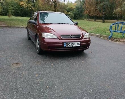 Красный Опель Астра, объемом двигателя 1.6 л и пробегом 234 тыс. км за 3800 $, фото 1 на Automoto.ua