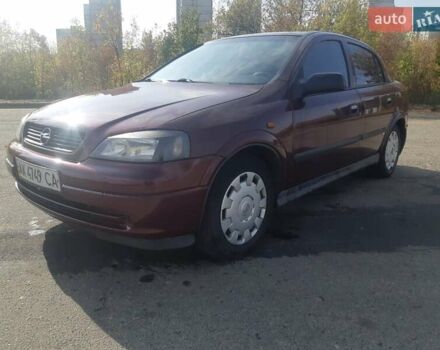 Красный Опель Астра, объемом двигателя 1.4 л и пробегом 320 тыс. км за 3450 $, фото 1 на Automoto.ua