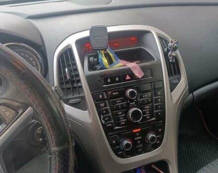 Красный Опель Астра, объемом двигателя 1.25 л и пробегом 319 тыс. км за 5000 $, фото 1 на Automoto.ua