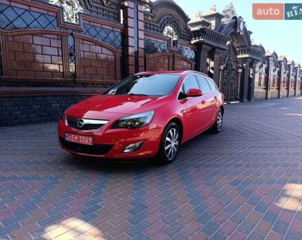 Красный Опель Астра, объемом двигателя 1.6 л и пробегом 167 тыс. км за 7999 $, фото 1 на Automoto.ua