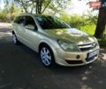 Желтый Опель Астра, объемом двигателя 1.8 л и пробегом 279 тыс. км за 4000 $, фото 1 на Automoto.ua
