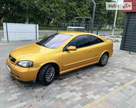 Желтый Опель Астра, объемом двигателя 1.8 л и пробегом 236 тыс. км за 3000 $, фото 1 на Automoto.ua