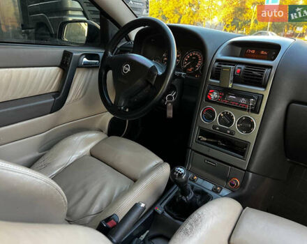 Желтый Опель Астра, объемом двигателя 1.8 л и пробегом 280 тыс. км за 2849 $, фото 8 на Automoto.ua