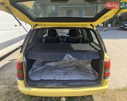 Желтый Опель Астра, объемом двигателя 1.8 л и пробегом 300 тыс. км за 1100 $, фото 15 на Automoto.ua