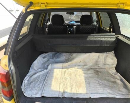 Жовтий Опель Астра, об'ємом двигуна 1.8 л та пробігом 300 тис. км за 1500 $, фото 3 на Automoto.ua